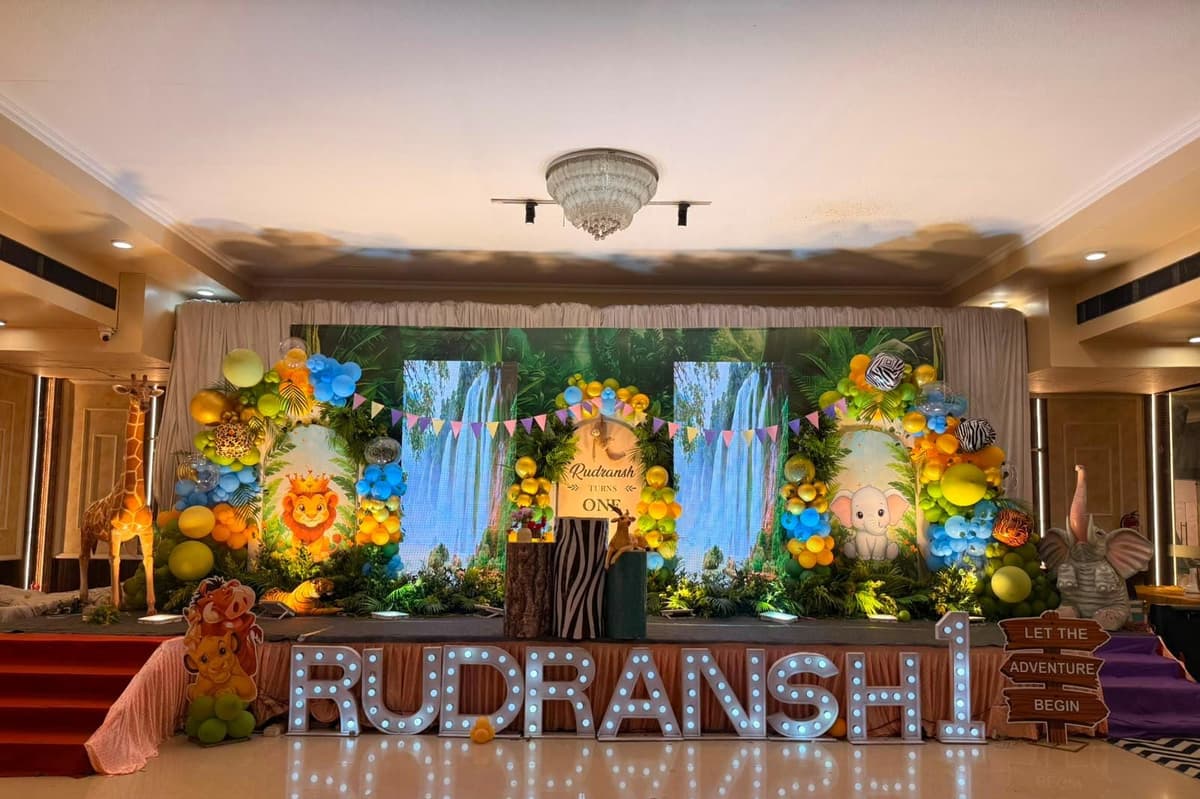 Jungle-themed first birthday stage