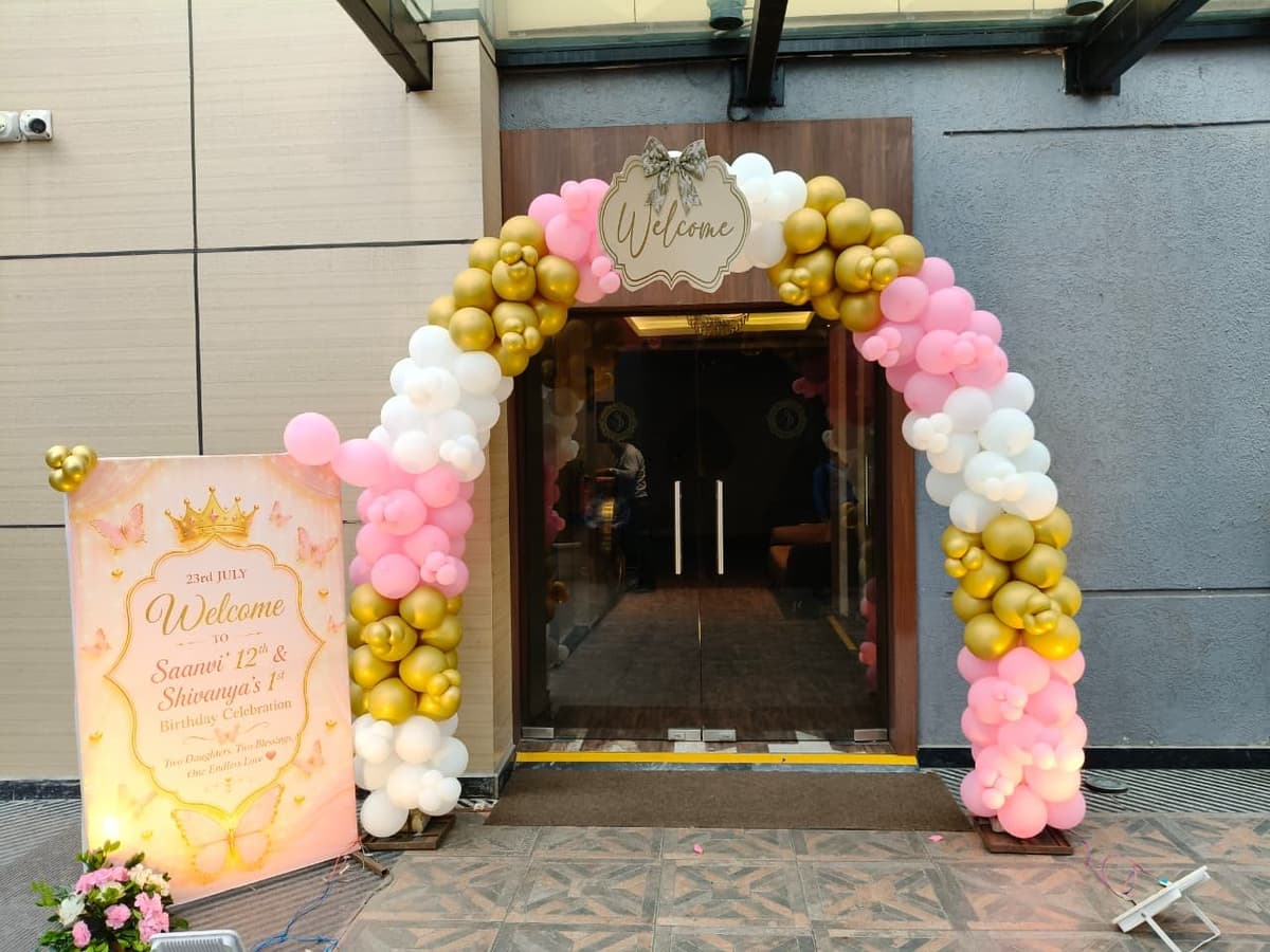 Pink & gold balloon entrance arch